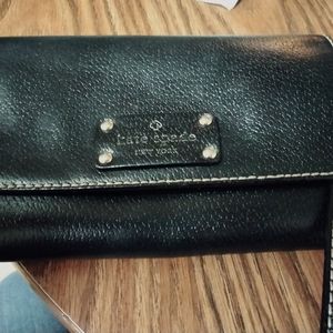 Black leather Kate spade crossbody purse.